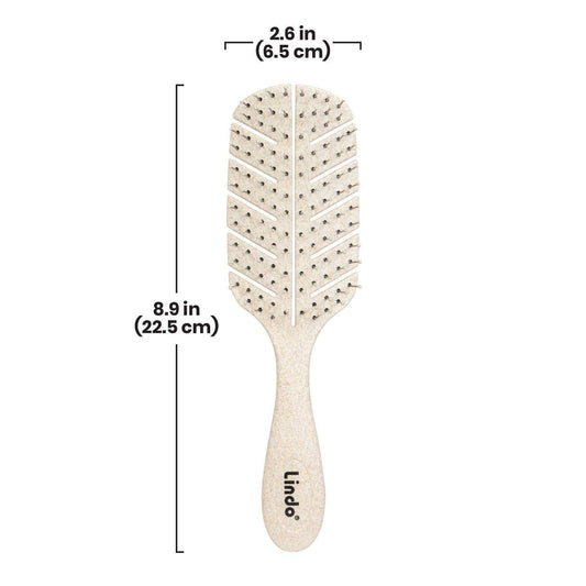 Eco plant fiber detangling hair brush bristles close-up, gentle flexible bristles for snag-free detangling