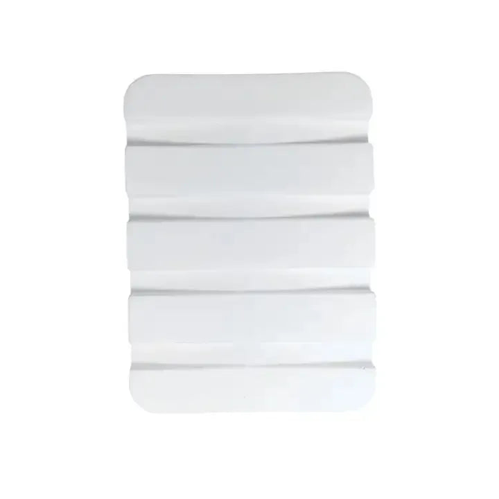 White diatomaceous earth concave soap dish close-up, water-absorbing design prevents mushy soap