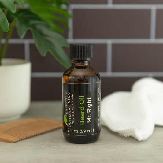 Natural beard oil 2 oz lifestyle shot showing conditioning beard care application