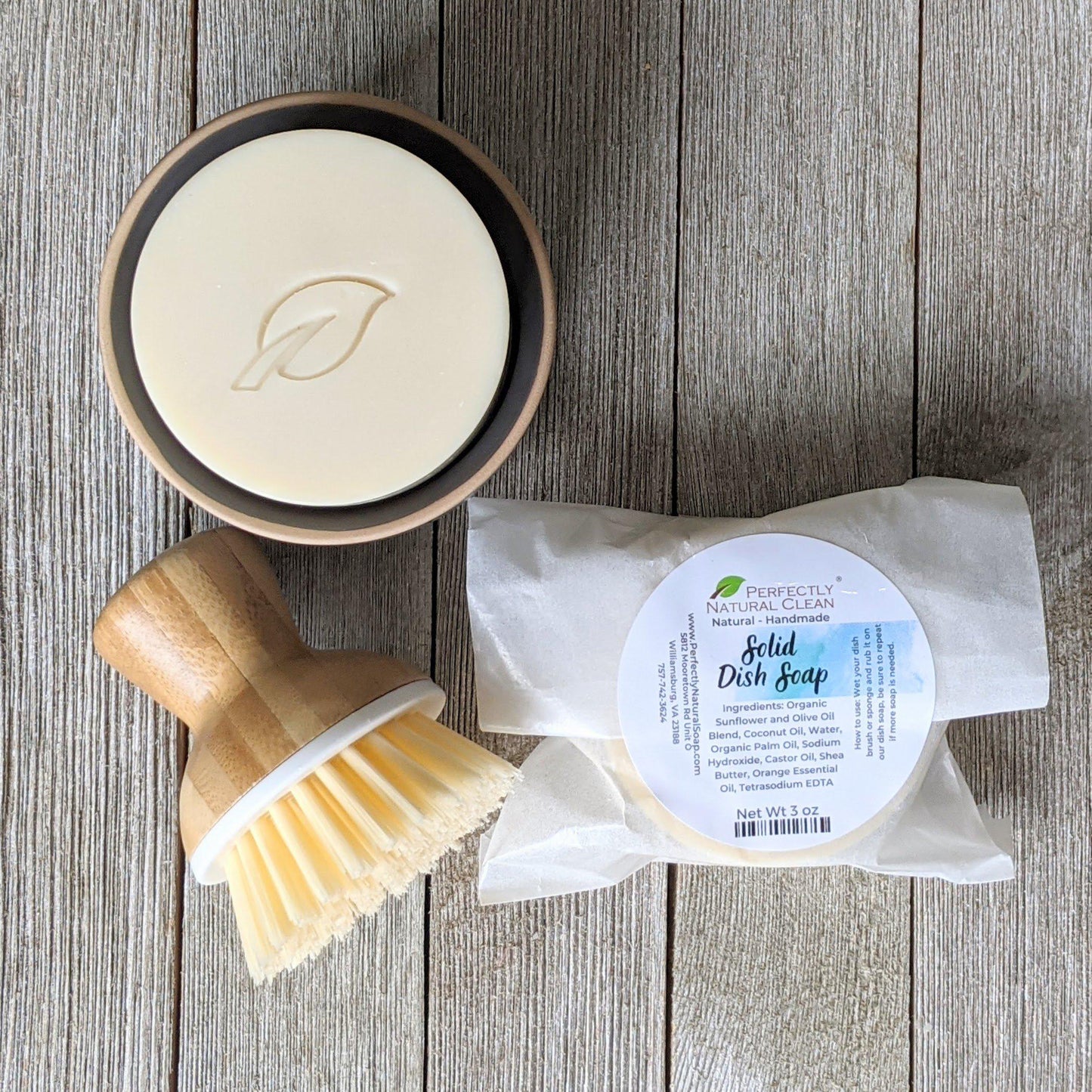 Bubble Up ceramic dish scrubber and soap holder in use at kitchen sink, eco-friendly dish set