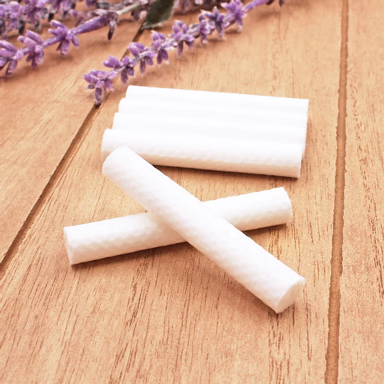 Inhaler tube wicks close-up showing cotton wick material, replacement wicks for aromatherapy nasal inhalers