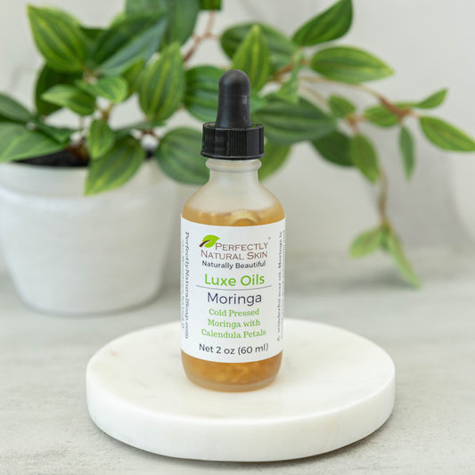 Luxe Oil moringa oil with calendula petals 2 oz, brightening botanical facial oil for anti-aging skin care