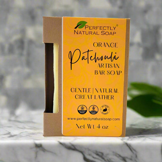 Orange patchouli natural soap bar close-up, handmade bar soap with fresh orange and deep patchouli lather
