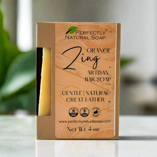 Orange Zing natural soap bar close-up showing fresh citrus lather, handmade orange soap bar 4 oz
