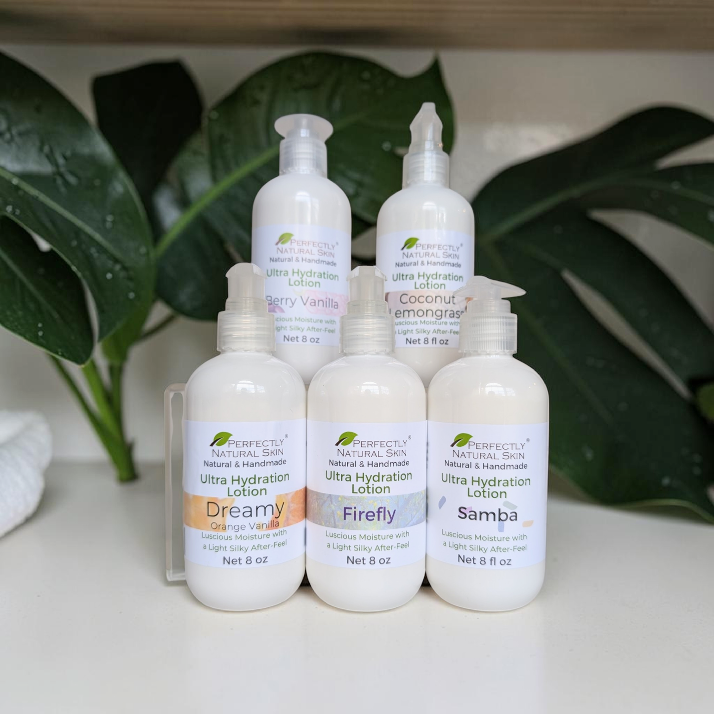 Ultra hydration body lotion 8 oz in use, lightweight fast-absorbing natural body lotion being applied