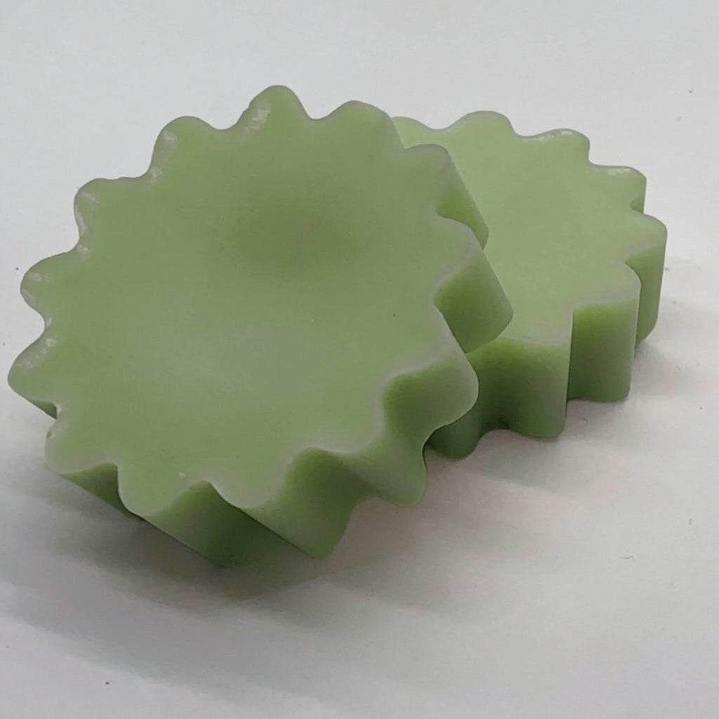 Wax tart individual 0.75 oz showing round shape, natural scented wax melt for warmers