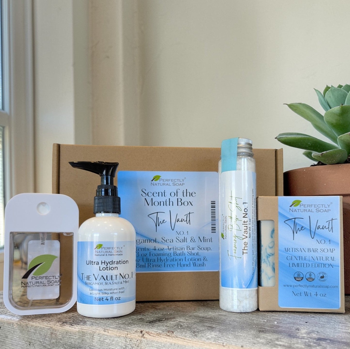 Prior month Scent of the Month variety box, assortment of natural soap and body care products from past month