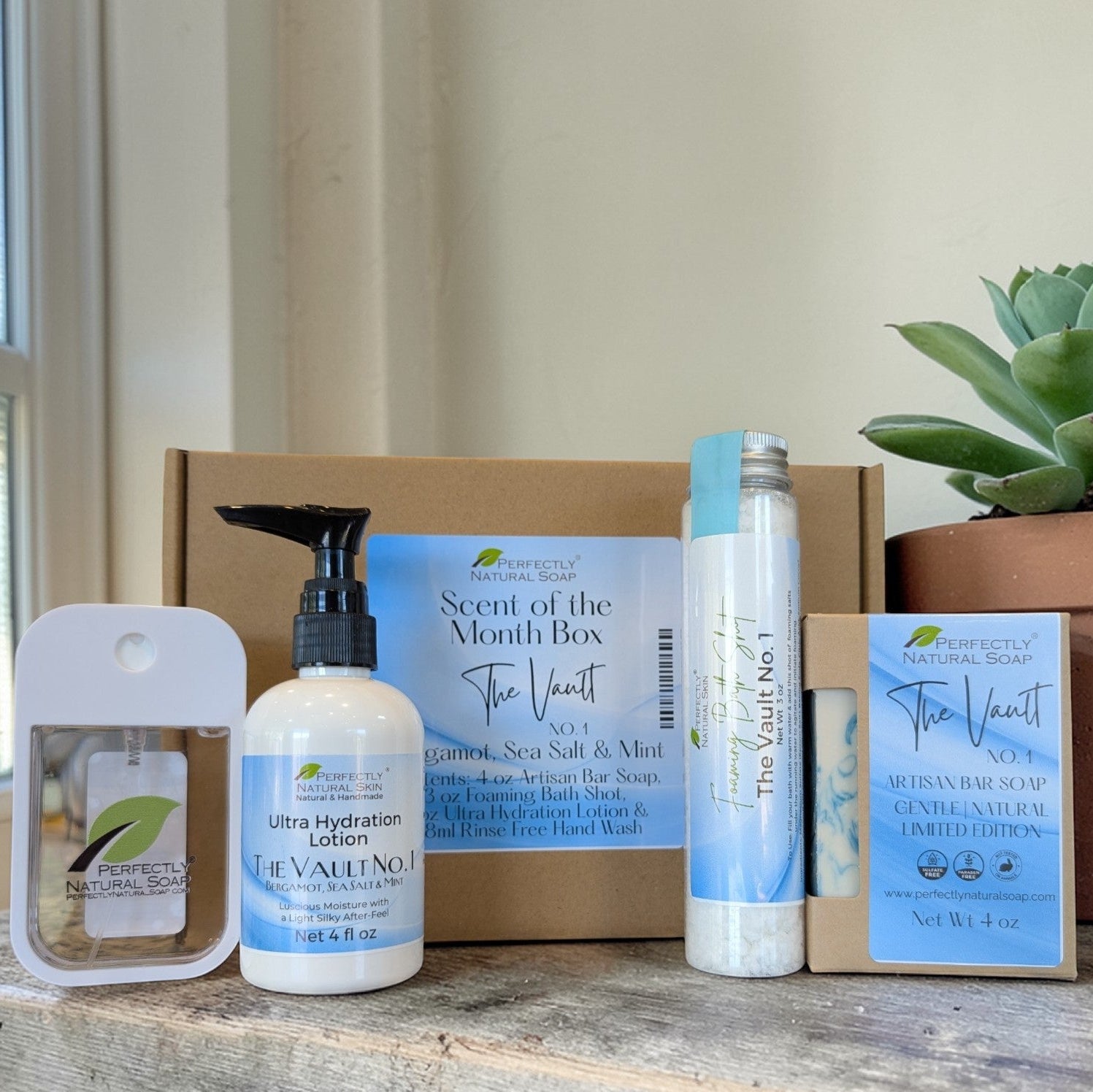 Prior month Scent of the Month variety box, assortment of natural soap and body care products from past month
