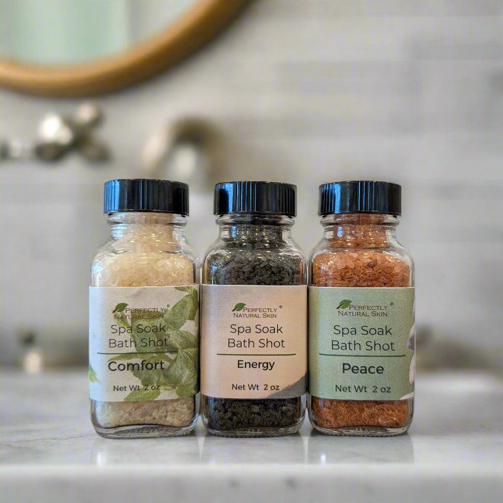 Spa Soak foaming mineral salts trial jars showing Comfort, Energy and Peace blends, 2 oz each