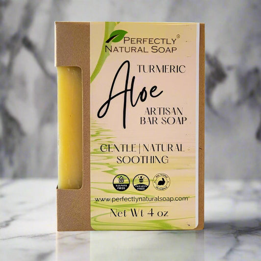 Turmeric aloe natural soap bar close-up showing golden hue, brightening handmade bar soap 4 oz